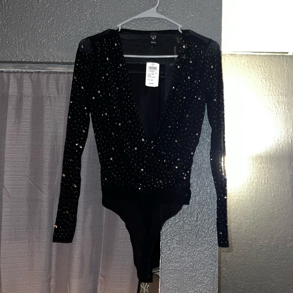Sheer black bodysuit size medium West sparkle gems on the front